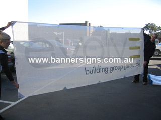 Outdoor mesh banner with tiny holes